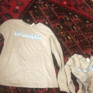 two grey long sleeve